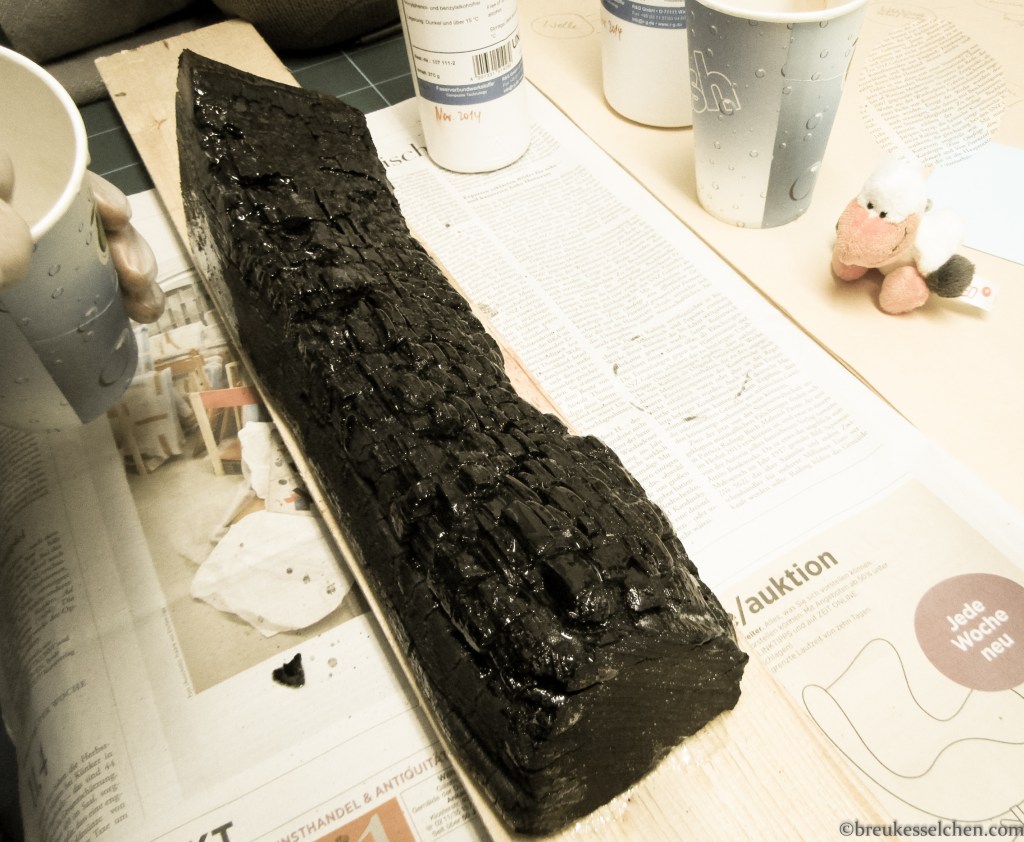 verkohlte Holzscheite geharzt 